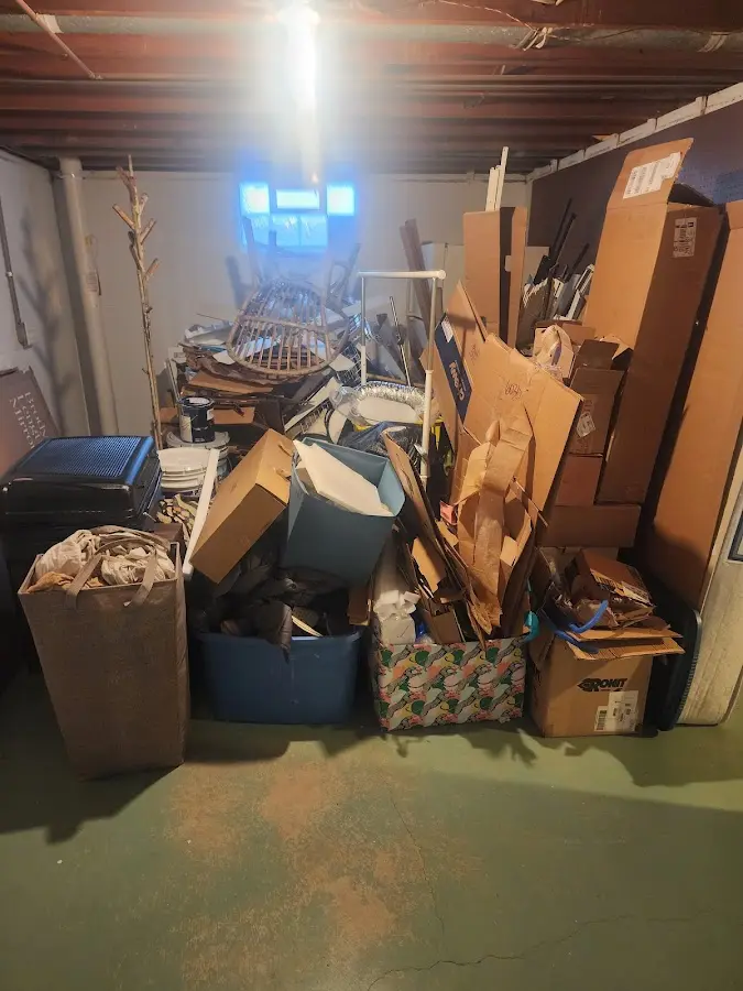 Roll-off dumpster container at job site for Cleanout Dumpster Rental in Maplewood